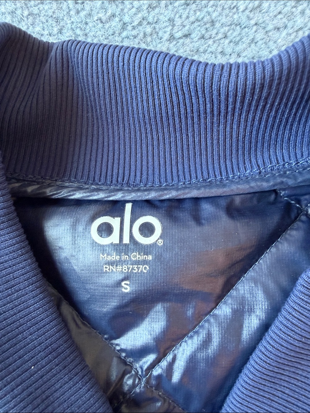 ALO Yoga Diamond-Quilted Navy Camo Bomber Jacket - Picture 2 of 8